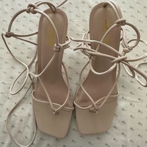 Size 9 women’s strappy nude heals.